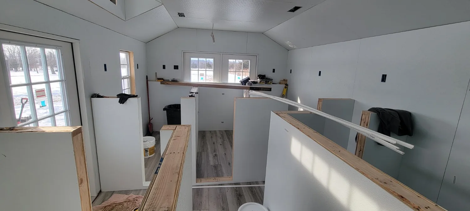 Interior build-out with finished wall panels and flooring